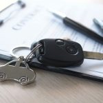 car-keys-placed-contract-documents-about-car-loans_112699-146